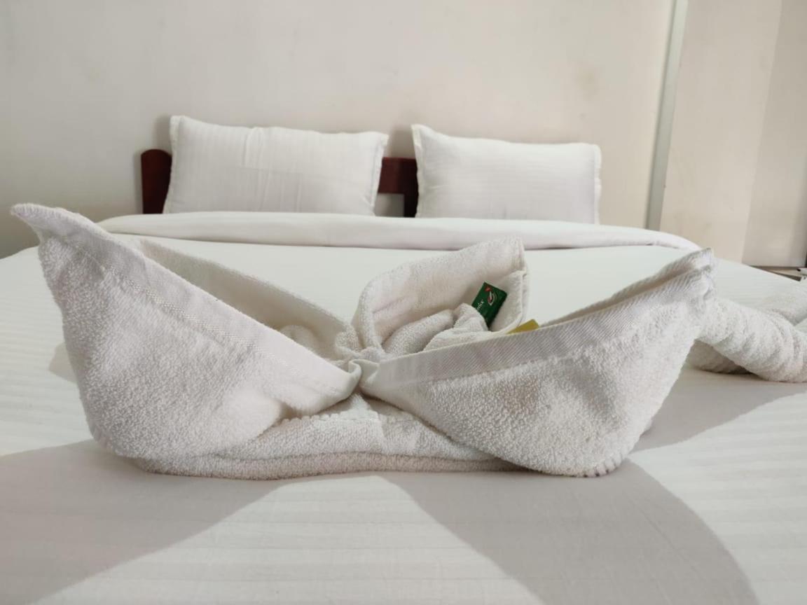 Frank Guest House Baga Esterno foto
